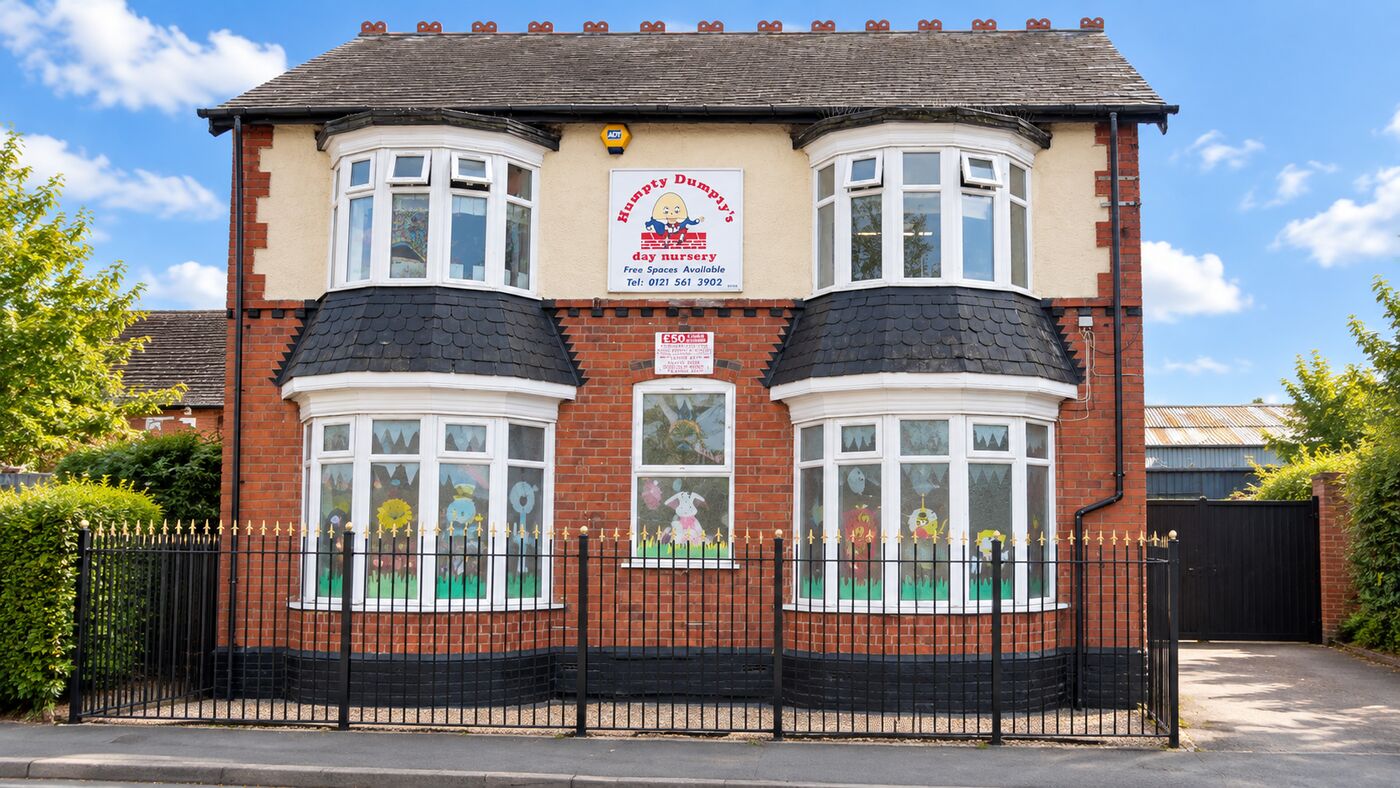 The front of Humpty Dumptys Day Nursery, with the nursery sign above the bay windows