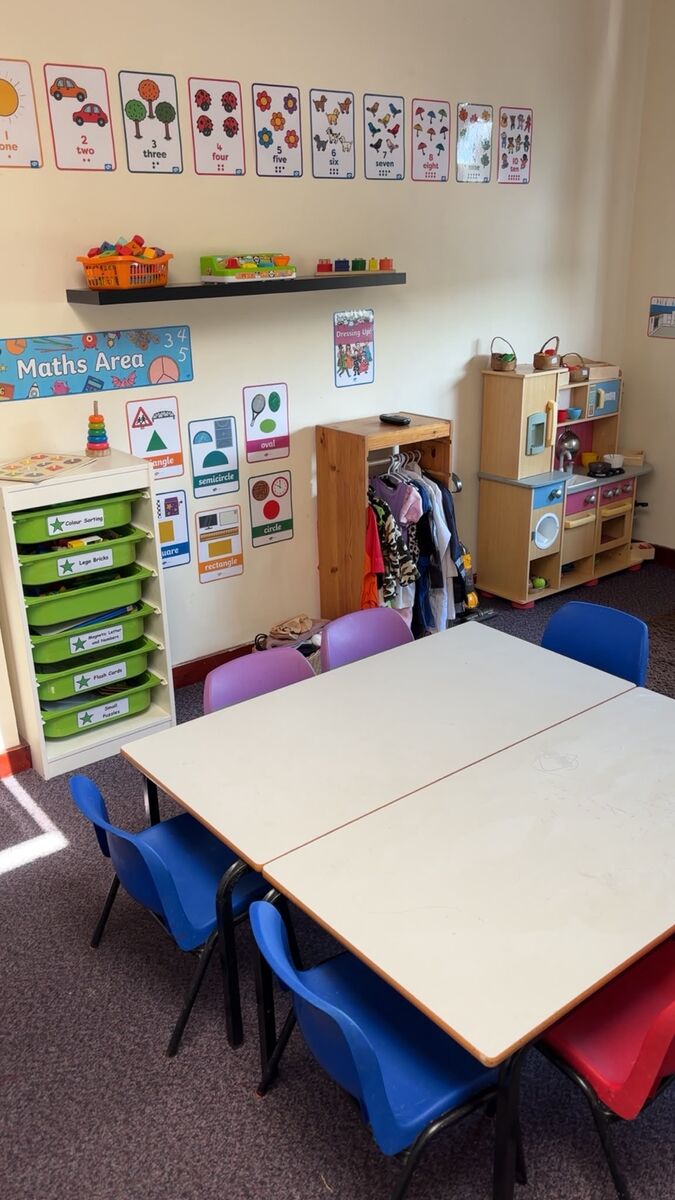 Maths area and a table set up for group activities