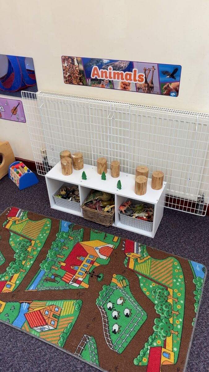 An animals display, road play mat and wooden play resources